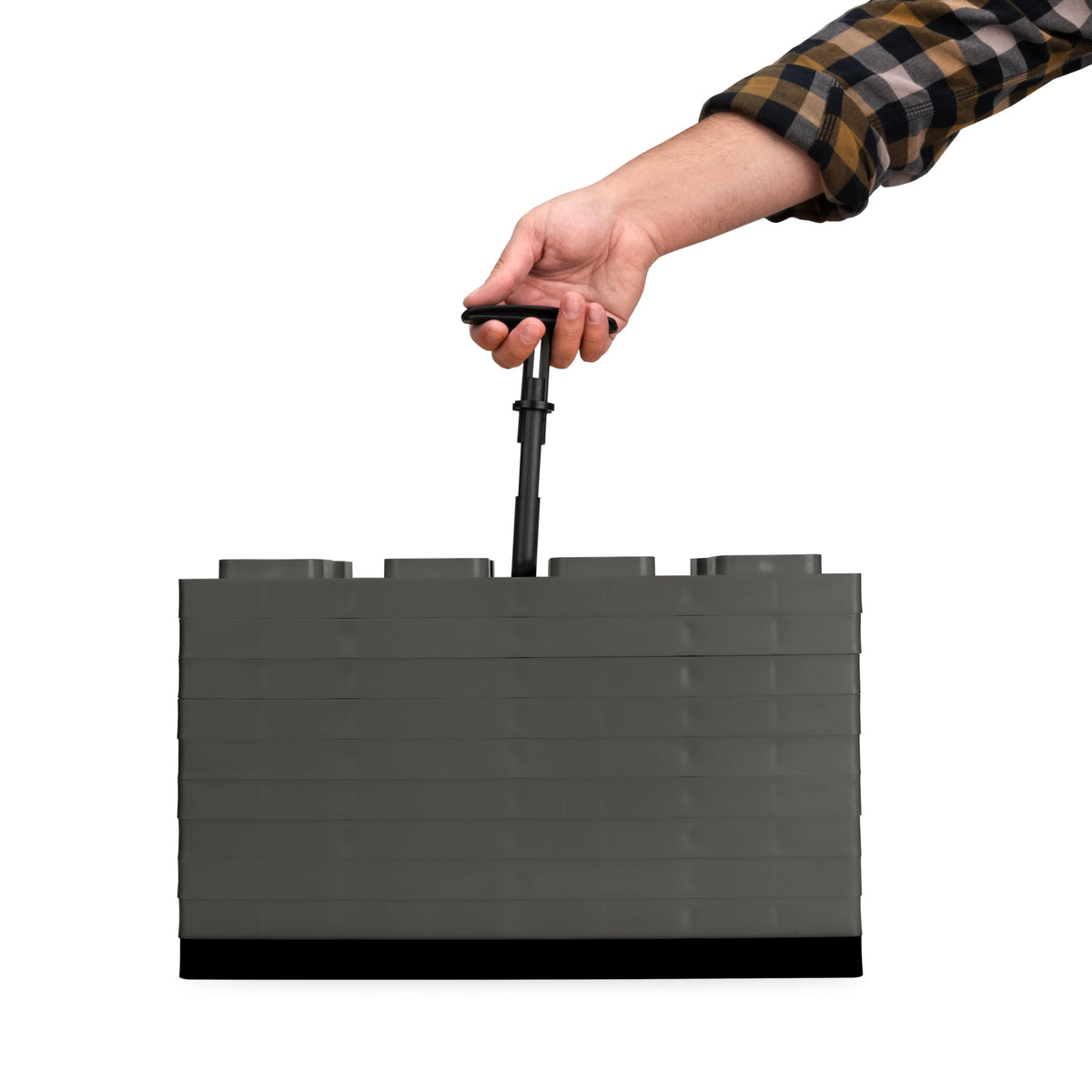 Camco FasTen blocks fitting neatly in RV storage compartment for convenience