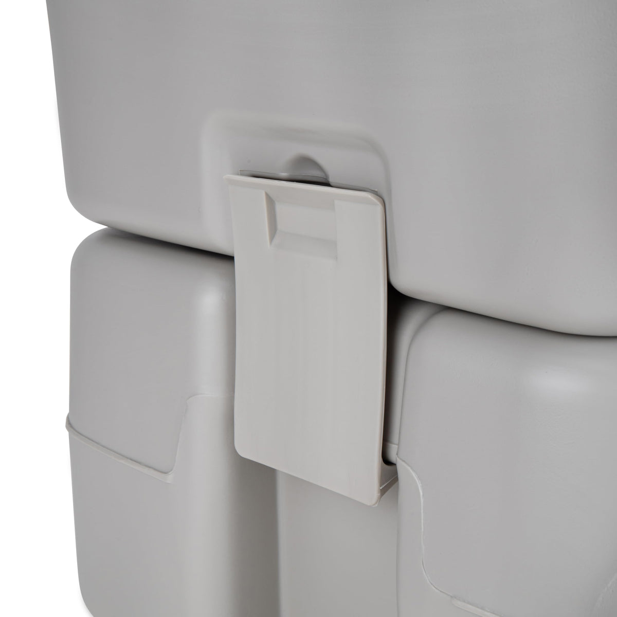 Camco portable toilet staged at a campsite offering hygienic convenience