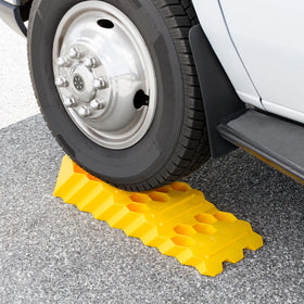 Camco in use with RV wheel on ramp for quick leveling