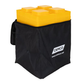 Camco leveling blocks in campsite scene illustrating easy setup and visible safety aid