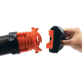 Camco cap being pulled with sewer hose attached demonstrating easy retrieval benefit