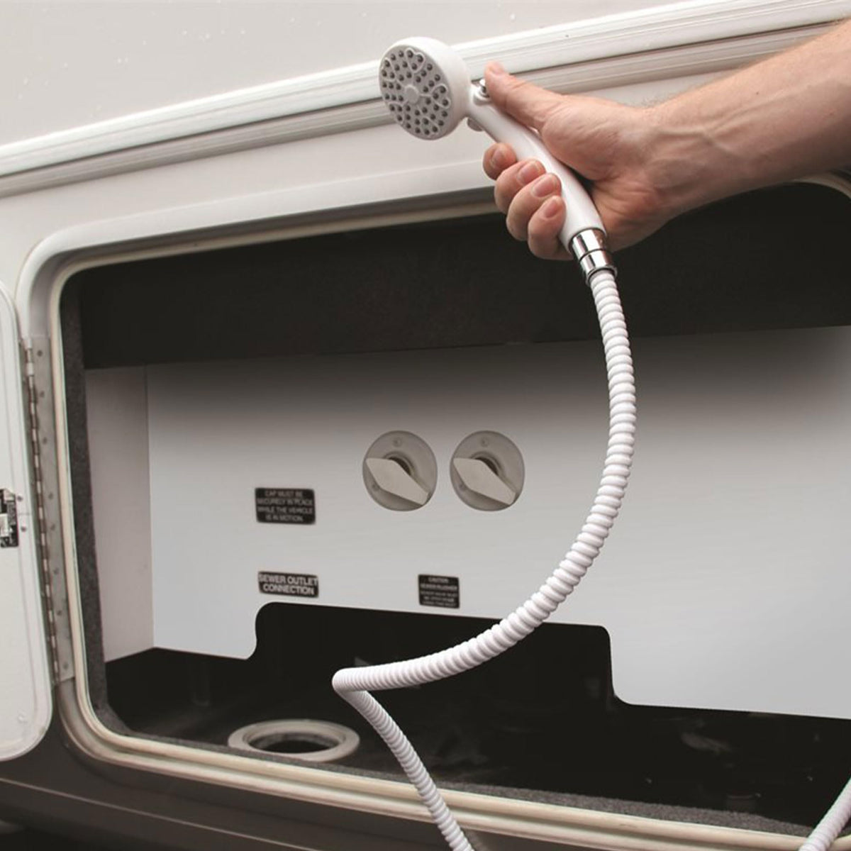 Camco shower head installed on RV hose showing easy screw-on installation benefit