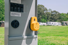 Camco PowerGrip connected to RV shore power demonstrating safe temporary hookup