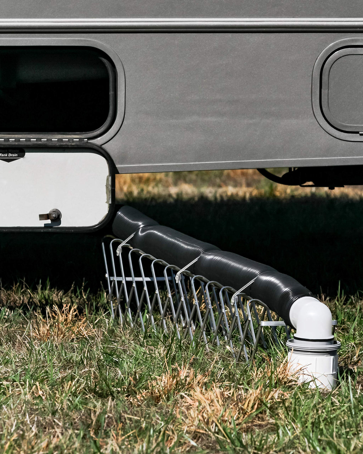 Camco close-up of pre-attached fittings showing unobstructed flow
