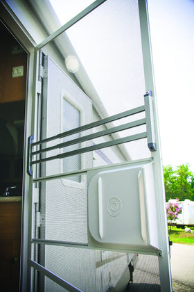 Camco push bar on RV at campground illustrating protection from pets and kids