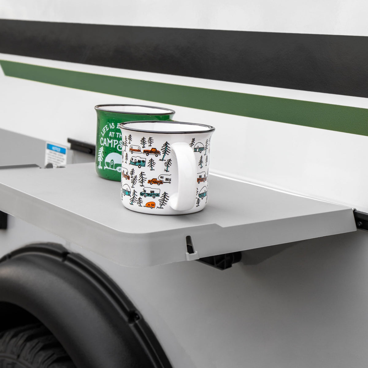 Camco folded storage profile demonstrating compactness and easy stowage benefit