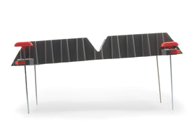 Camco on concrete pad showing stake-free use on hard surfaces benefit