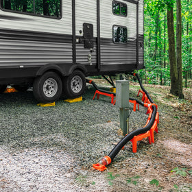 Camco Rhino beside a 3 inch RV sewer hose showing fit and length support benefit