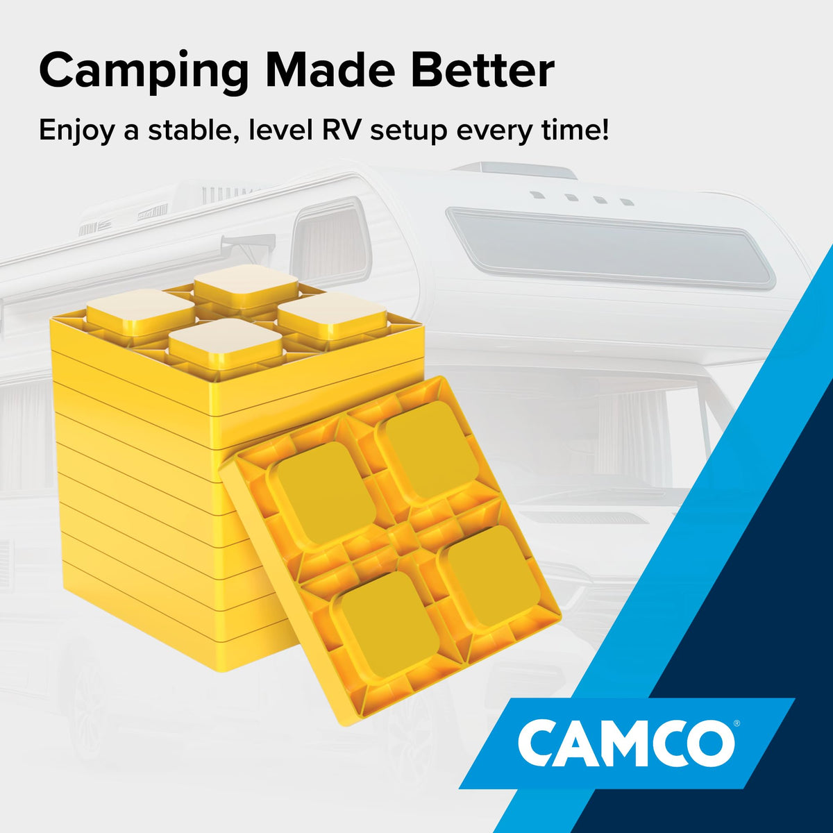 Camco block beside a coin for scale showing 8.5 inch footprint for wide load distribution