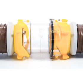 Camco adapter held in hand showing compact size for easy storage