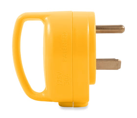 Camco plug stowed inside RV cable hatch for protected travel and storage