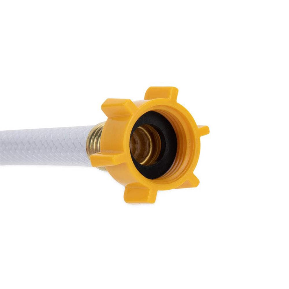 Camco TastePURE connected to RV spigot demonstrating clean potable water supply