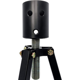 Camco tripod beside a ruler for scale to confirm size and portability benefit