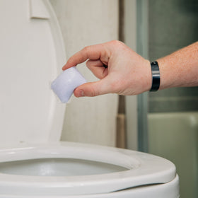 Camco TST MAX pod in boat toilet illustrating marine-safe holding tank benefit
