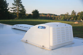 Camco vent cover next to measuring tape showing dimensions for 14x14 vent compatibility