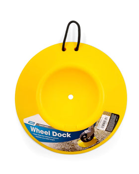 Camco wheel dock placed under trailer tongue wheel to prevent sinking benefit