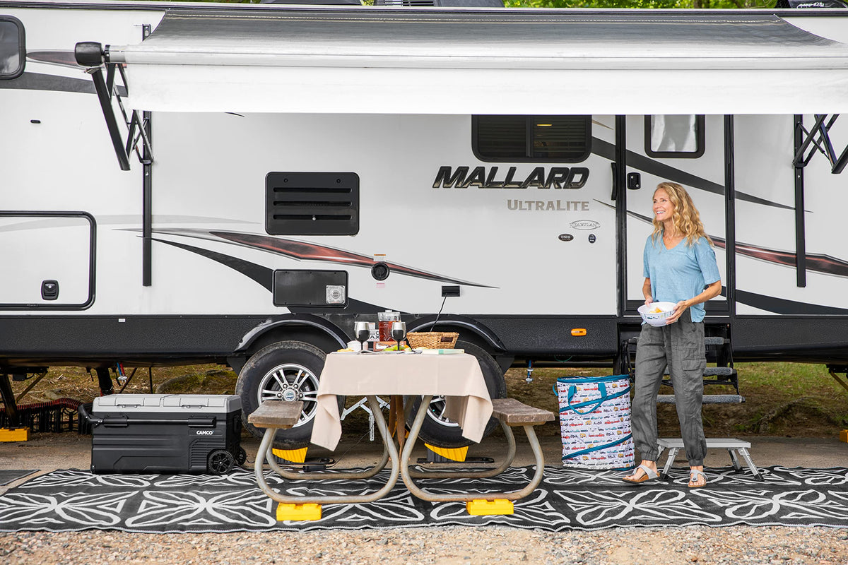 Camco zippered storage bag holding blocks for easy transport and storage
