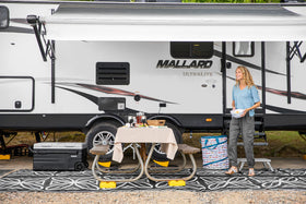 Camco zippered storage bag holding blocks for easy transport and storage