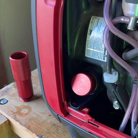 Camoo in-use image fueling generator through hose demonstrating continuous run refueling