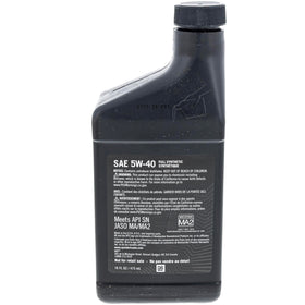 Can-Am oil being poured into engine showing easy application and protection
