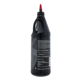 Can-Am XPS bottle placed next to a differential during service, illustrating compatibility and use