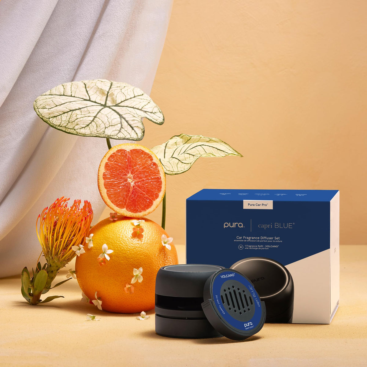 Capri Blue Pura Car Pro beside USB‑C cord, highlighting easy charging benefit