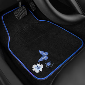 CAR PASS driver side close-up embroidery highlighting decorative butterfly detail