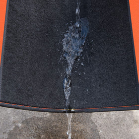 CAR PASS installed front and rear mats demonstrating full-coverage protection