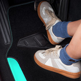 CAR PASS mats installed in front seats showing tidy cabin protection