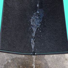 CAR PASS mats installed in rear seats showing full-vehicle coverage