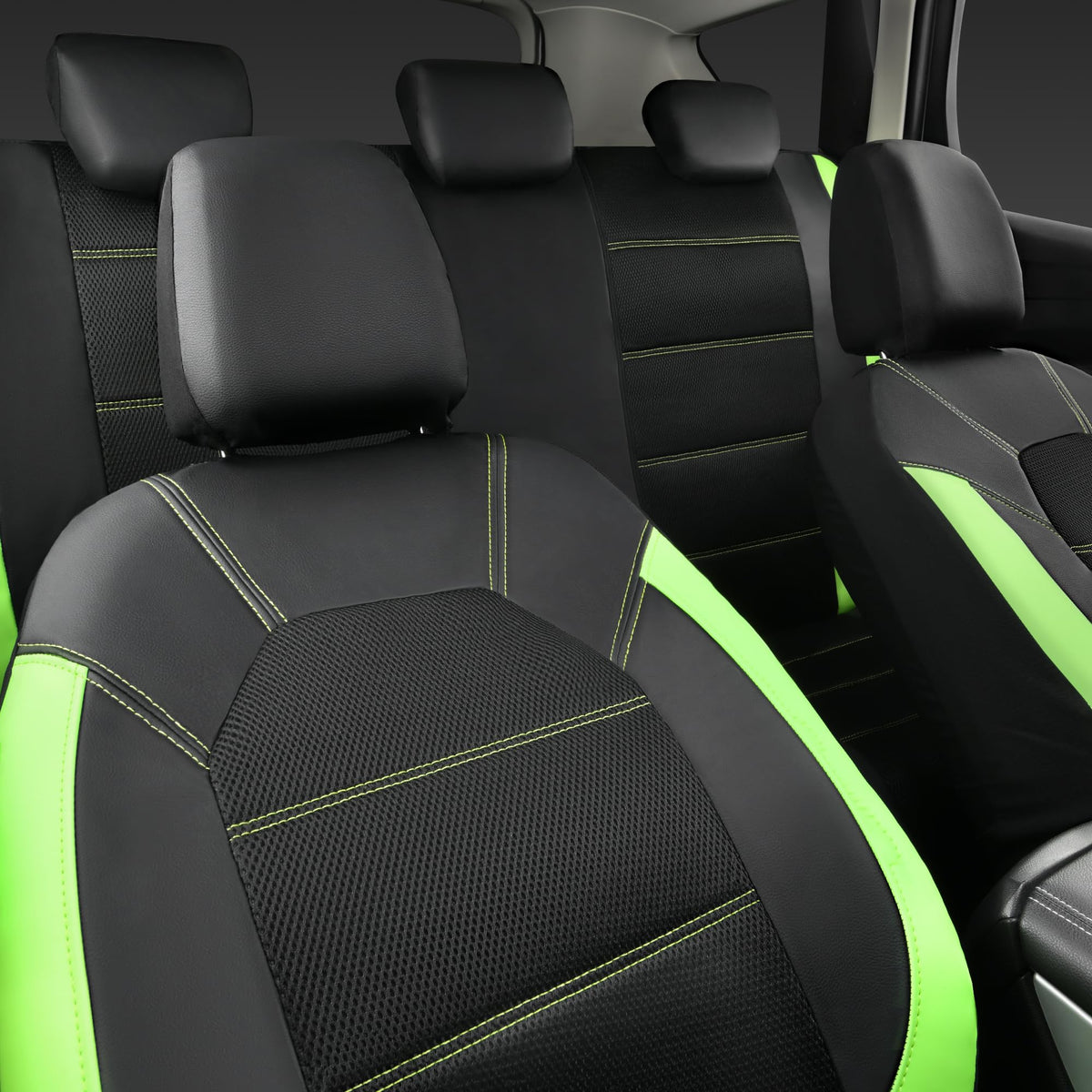CAR PASS seat covers next to steering wheel for scale showing coverage and fit