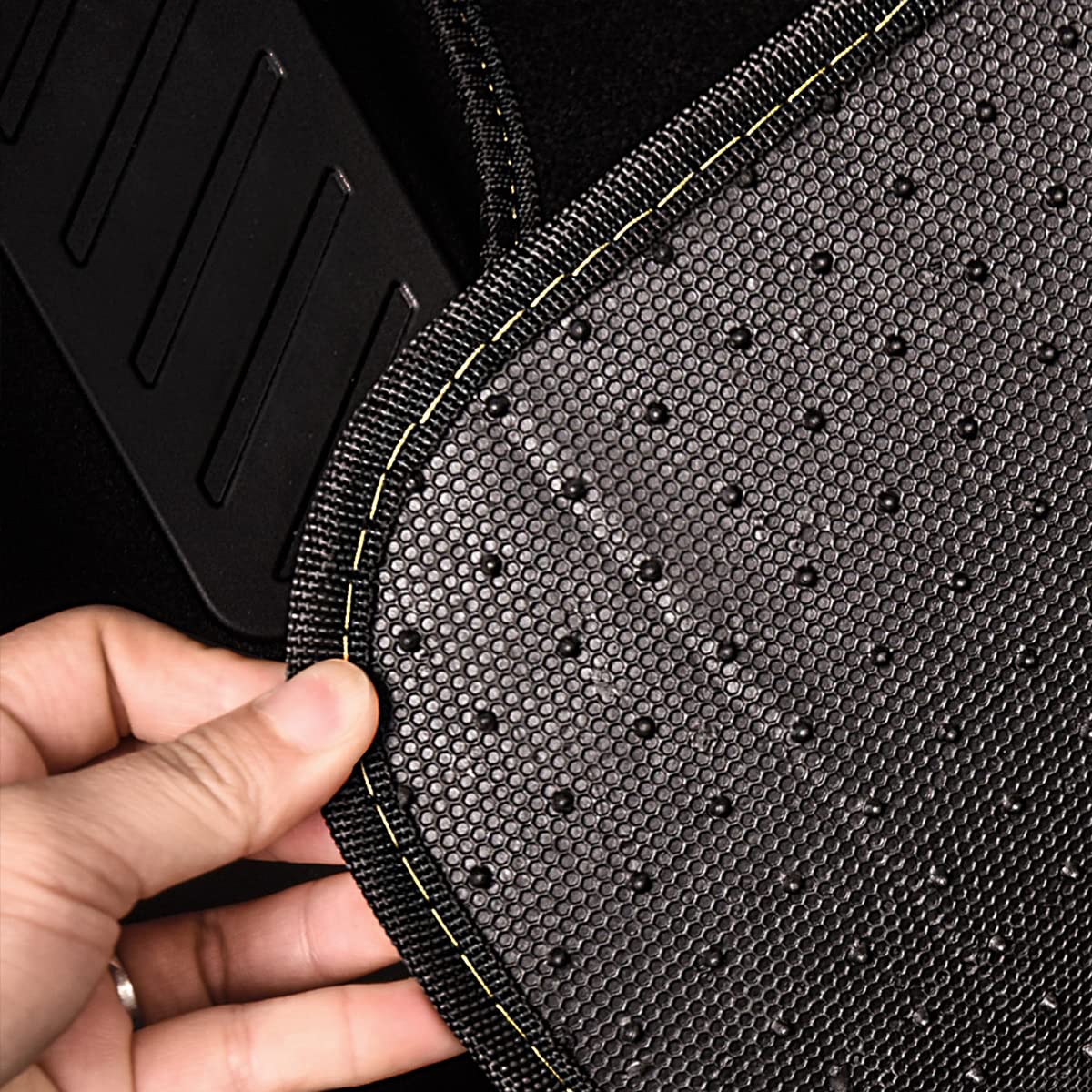 CAR PASS faux-leather texture being wiped clean for quick maintenance