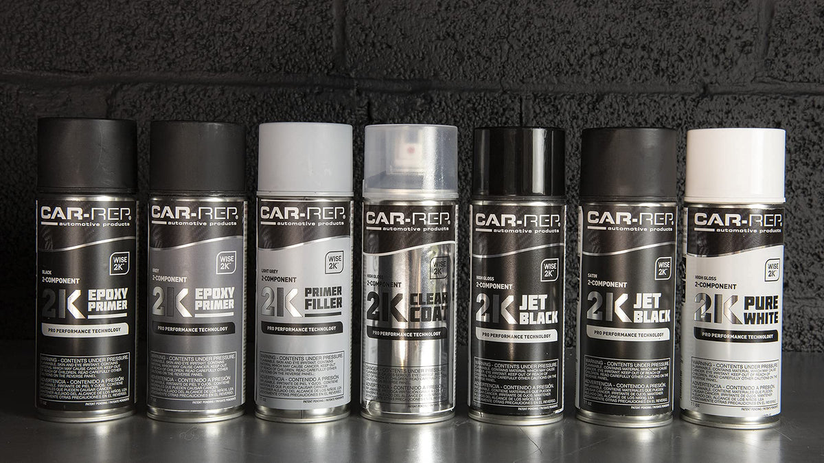 CAR-REP 2K next to hand for scale showing compact 11oz aerosol convenience benefit