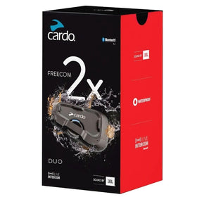 Cardo FREECOM 2X mounted on helmet side profile demonstrating secure clamp and low profile