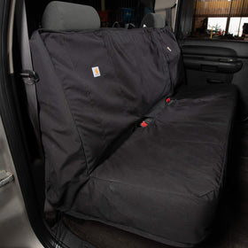 Carhartt on bench seat showing fit and scale for full-size trucks