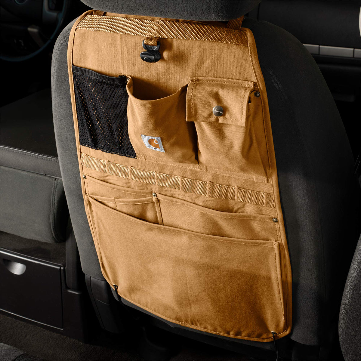 Carhartt hook and side-release buckle close-up for fast install and removal benefit