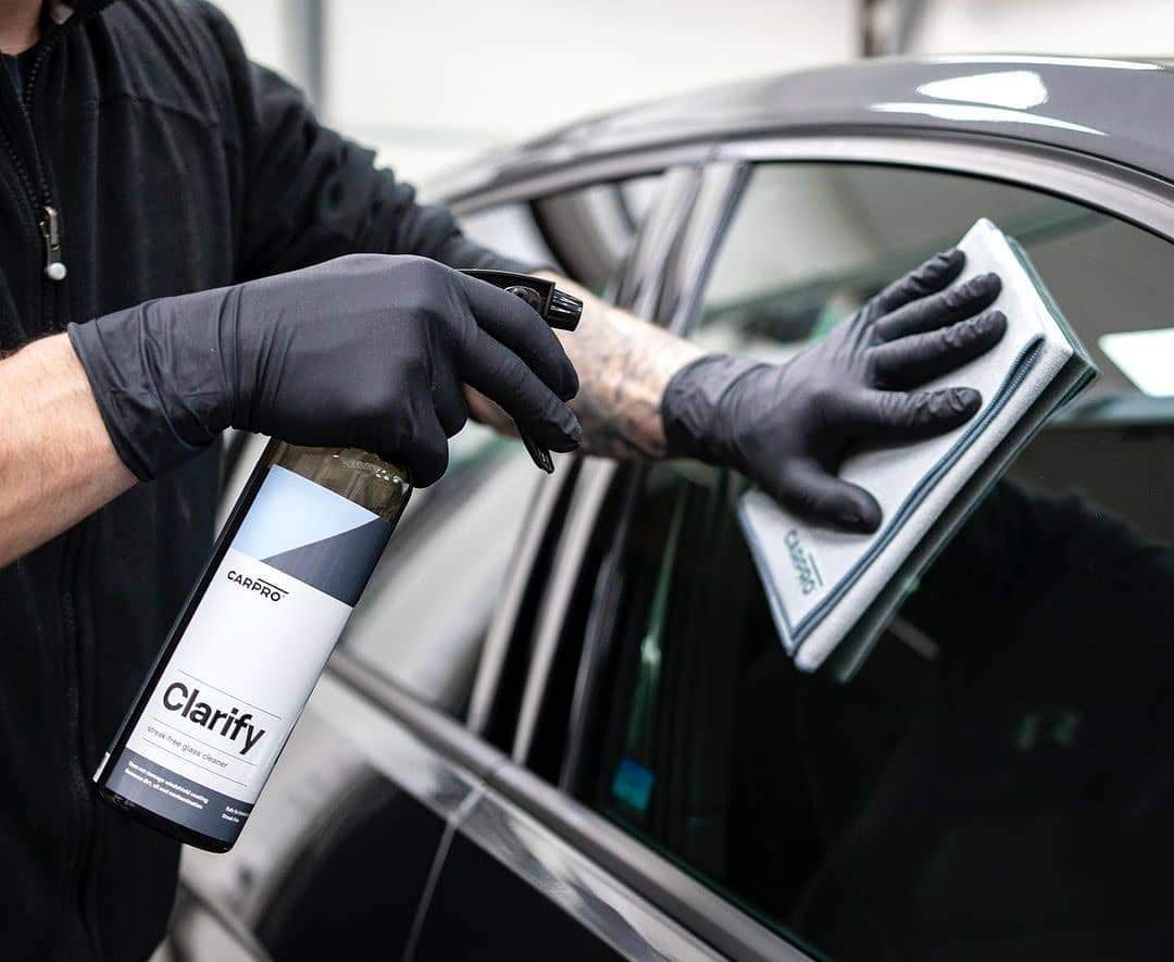 CARPRO Clarify close-up of liquid texture on glass, shows fast-acting cleaning power