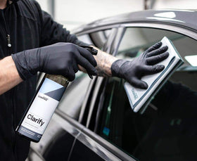 CARPRO Clarify close-up of liquid texture on glass, shows fast-acting cleaning power