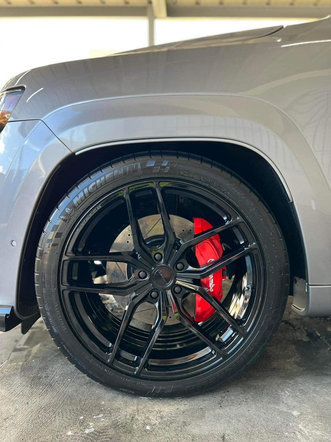 CARPRO DarkSide applied to tire sidewall showing satin black renewal