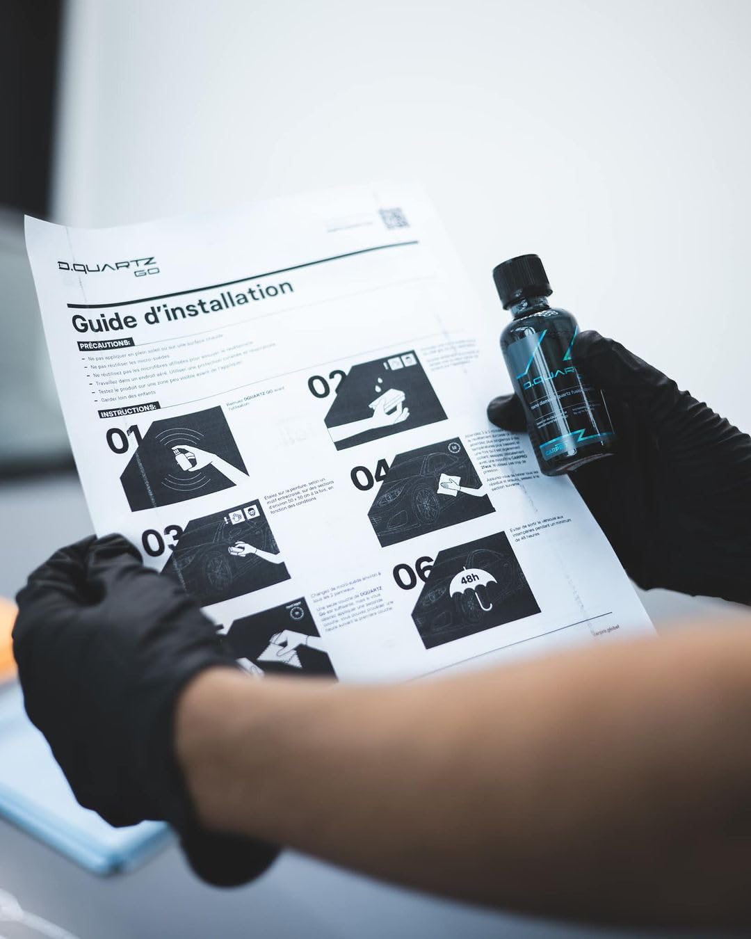 Close-up of coated clearcoat by CARPRO DQUARTZ GO showing smooth glossy finish and scratch resistance