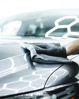 CARPRO DQUARTZ GO applied to household appliance and car in driveway showing versatile protection