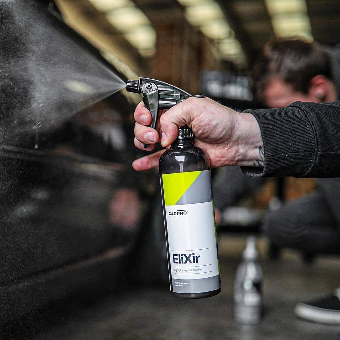 CARPRO Elixir wipe revealing deep gloss and enhanced paint clarity benefit