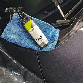 CARPRO Elixir on panel with water beading demonstrating strong hydrophobic effect