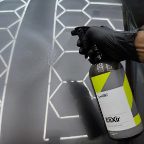 CARPRO EliXir on white paint showing improved depth and stain-free finish