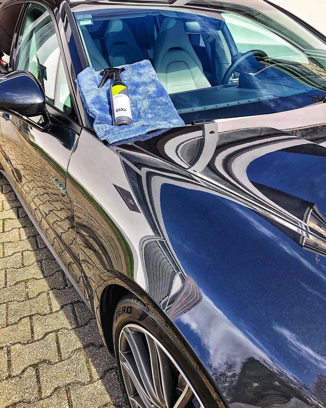 CARPRO Elixir beside ruler showing 500ml bottle size and convenient handling