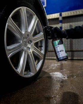 CARPRO HydrO2 Lite being sprayed on a car panel for fast touchless protection