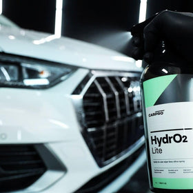 CARPRO HydrO2 Lite applied in wheel well demonstrating dirt-shedding advantage