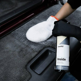 CARPRO diluted solution on Alcantara swatch showing safe gentle cleaning