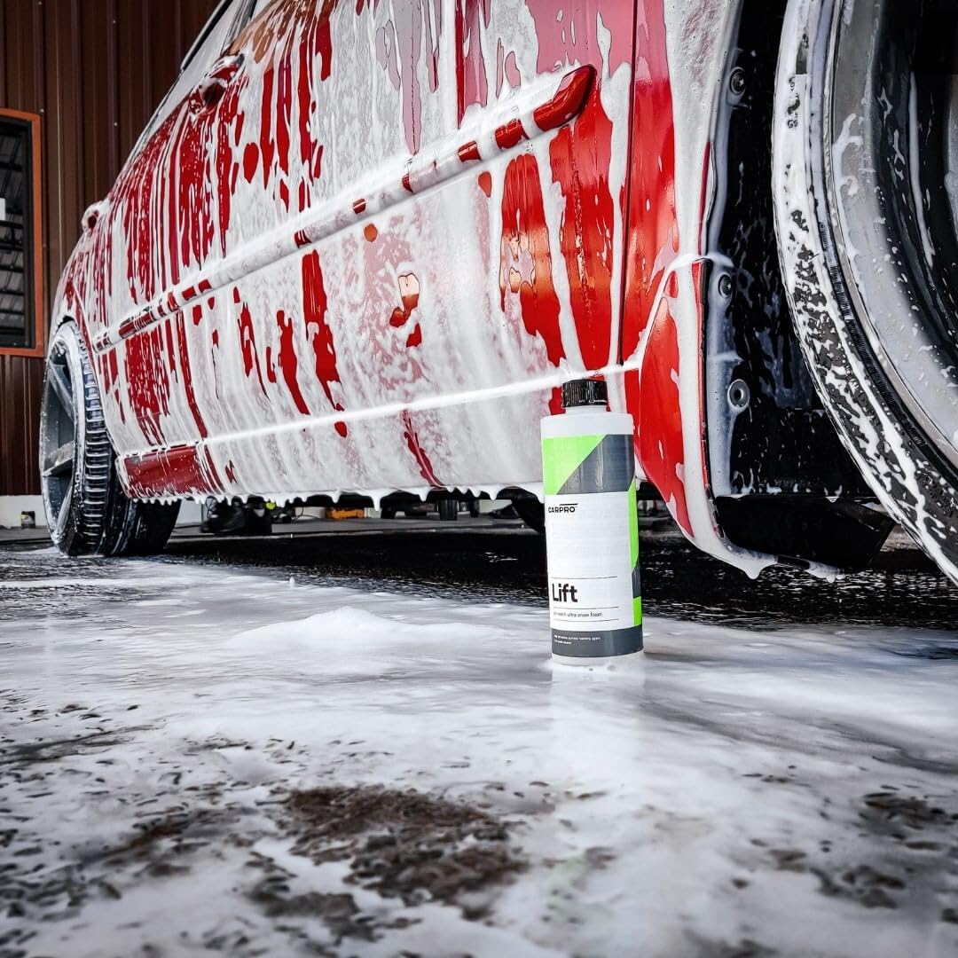 CARPRO foam applied to wheel and brake area, loosens brake dust for easier rinse