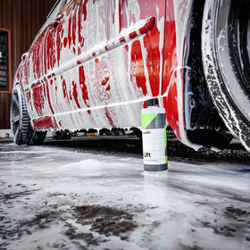 CARPRO foam applied to wheel and brake area, loosens brake dust for easier rinse